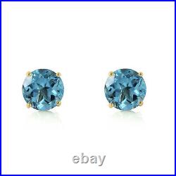 14k. Solid Gold Stud Earrings With Natural Blue Topaz