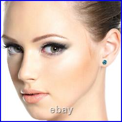 14k. Solid Gold Stud Earrings With Natural Blue Topaz