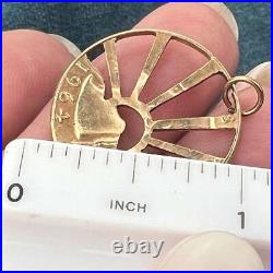 14k Yellow Gold (Solid) US Quarter Coin Cut-Out Sunburst Pendant 14k Yellow Gold (Solid) US Quarter Coin Cut-Out Sunburst Pendant