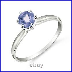 18K. SOLID GOLD SOLITAIRE RING WITH NATURAL TANZANITE (White Gold)