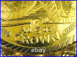 1990 Isle of Man NY Alloy Cat 999.0 gold coin in 14K rope bezel. 1 1/8.9.1gm