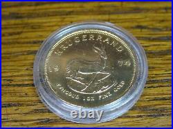 1oz gold Krugerrand coin. Dated 1974 in capsule. Genuine article