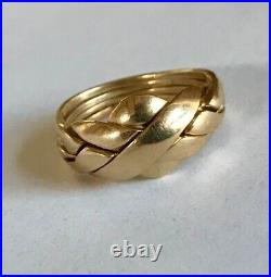 5.8 g GOLD solid 12kt puzzle ring. 8.25 ring size about 18mm in diameter