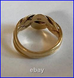 5.8 g GOLD solid 12kt puzzle ring. 8.25 ring size about 18mm in diameter