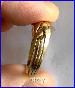 5.8 g GOLD solid 12kt puzzle ring. 8.25 ring size about 18mm in diameter