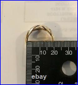 5.8 g GOLD solid 12kt puzzle ring. 8.25 ring size about 18mm in diameter