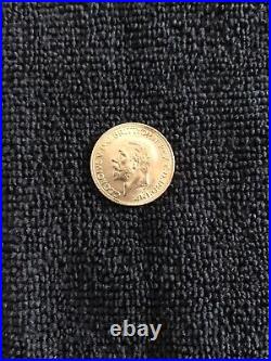 Solid gold coin 1931 Sovereign 24k